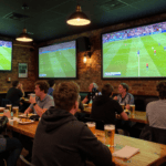 Best sports bar Coventry showing live football on big screens with cheering fans